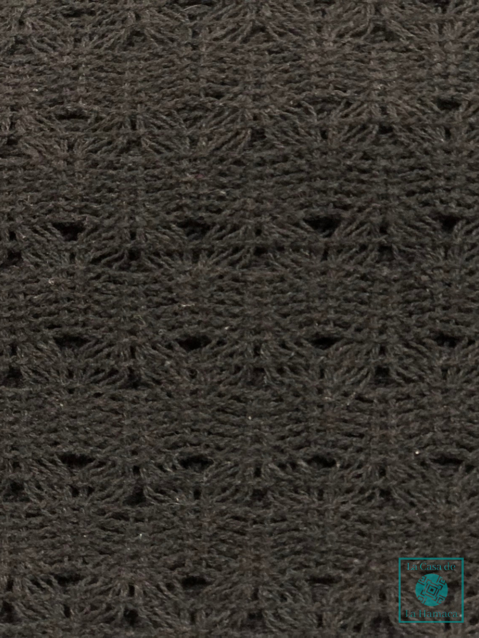 Detalle del tejido de hamaca negra de algodón