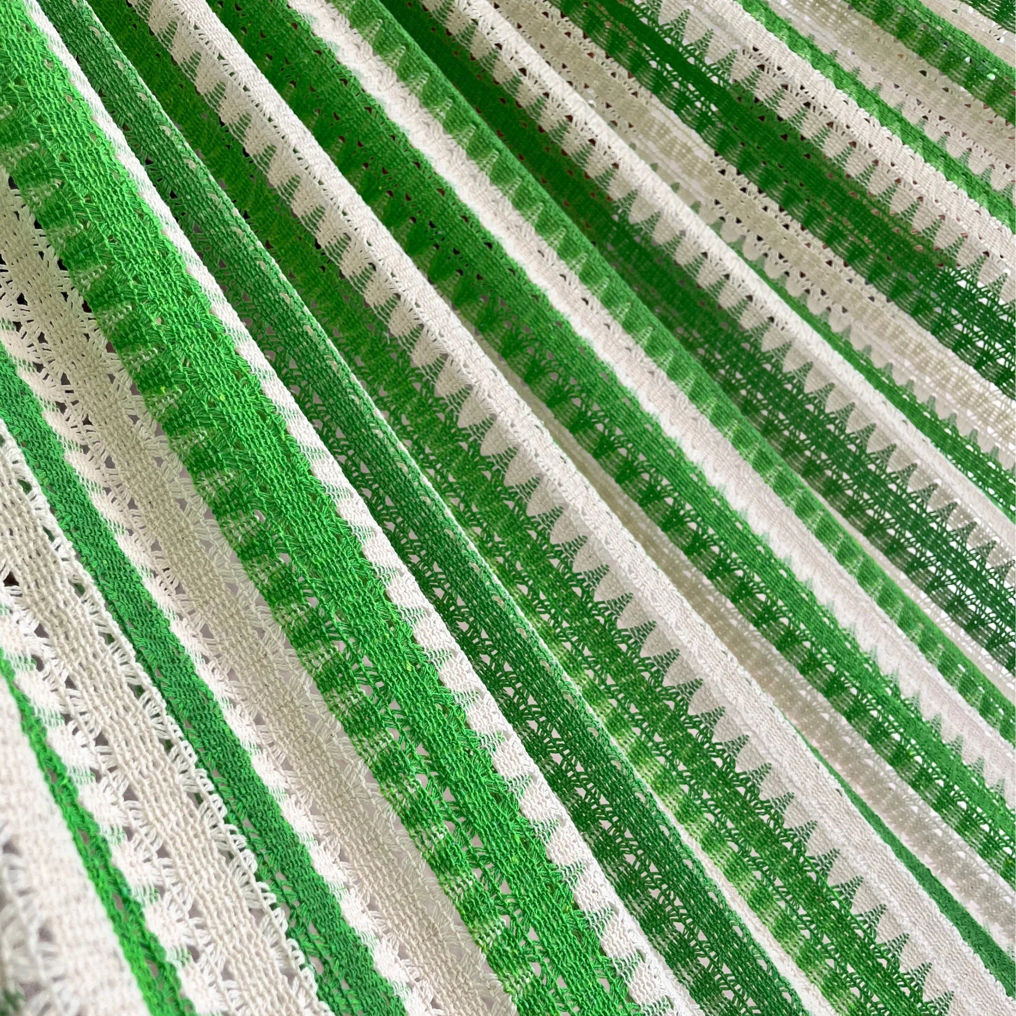 Detalle del tejido de hamaca verde grande de algodón